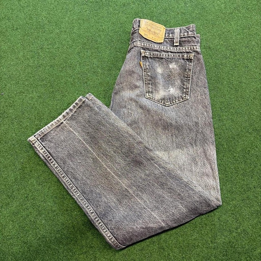 Vintage 90s faded black orange tab Levi's 505 relax fit straight leg denim jeans
